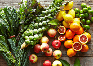 a group of fruits and vegetables on a wood surface Healthy Weight Loss Diets Margate