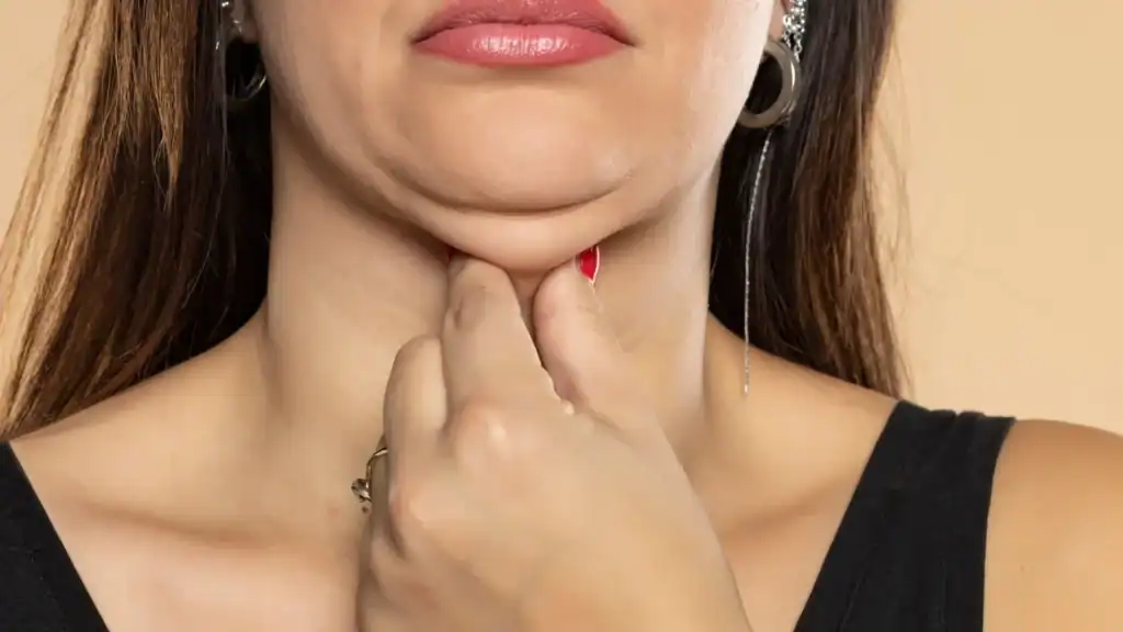 An image of a woman with double chin, sad, worried : Non Surgical Double Chin Removal Treatment in Margate, UK